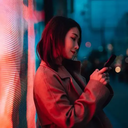 woman looking at her phone