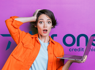 Forgetful woman holding laptop