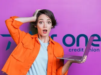 Forgetful woman holding laptop
