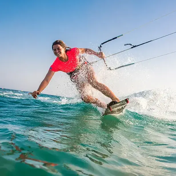 a woman on a wake board