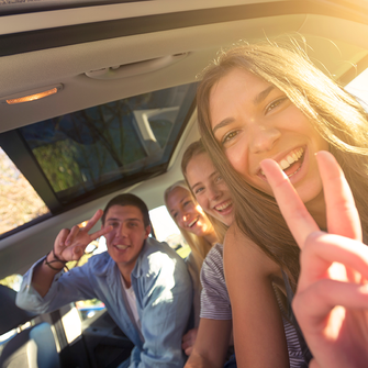 a group of people in a car
