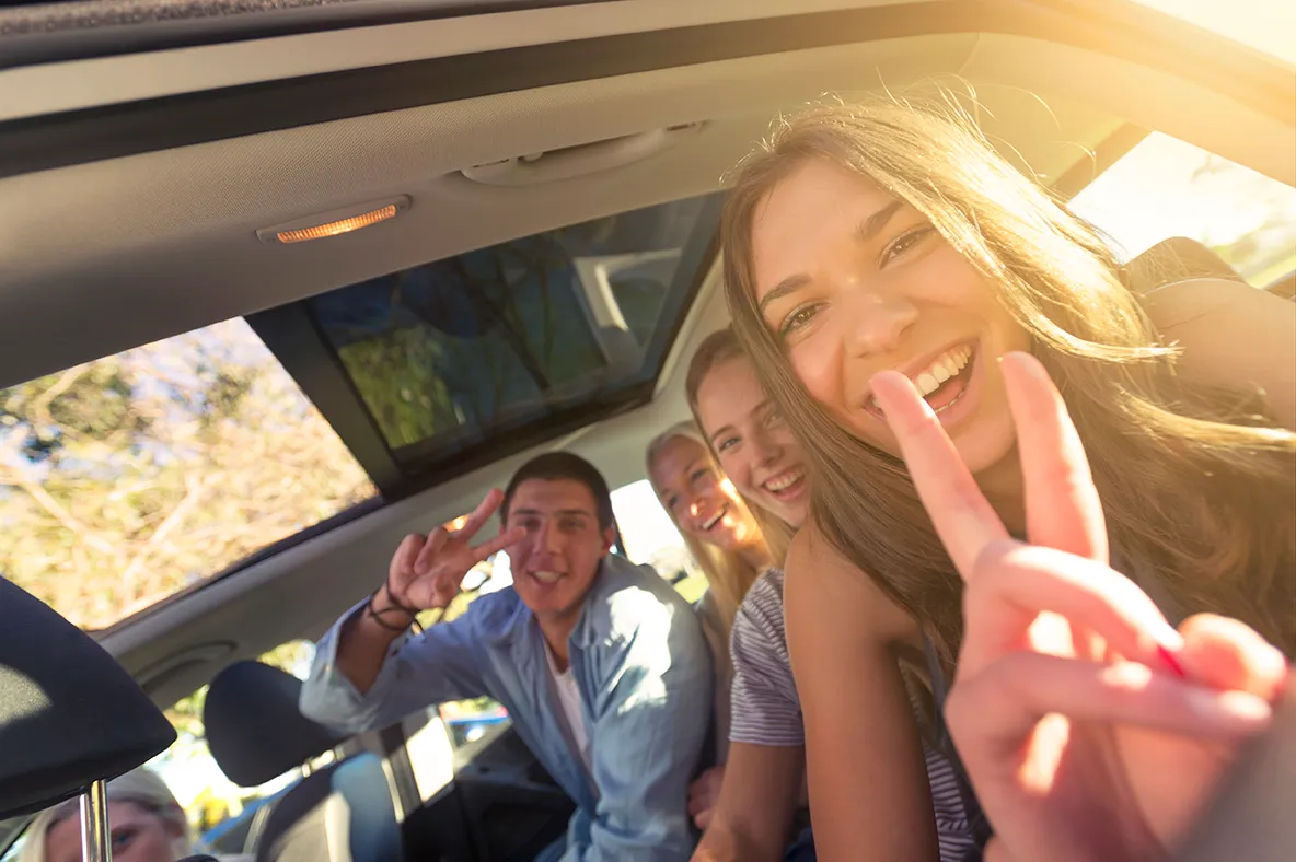 a group of people in a car