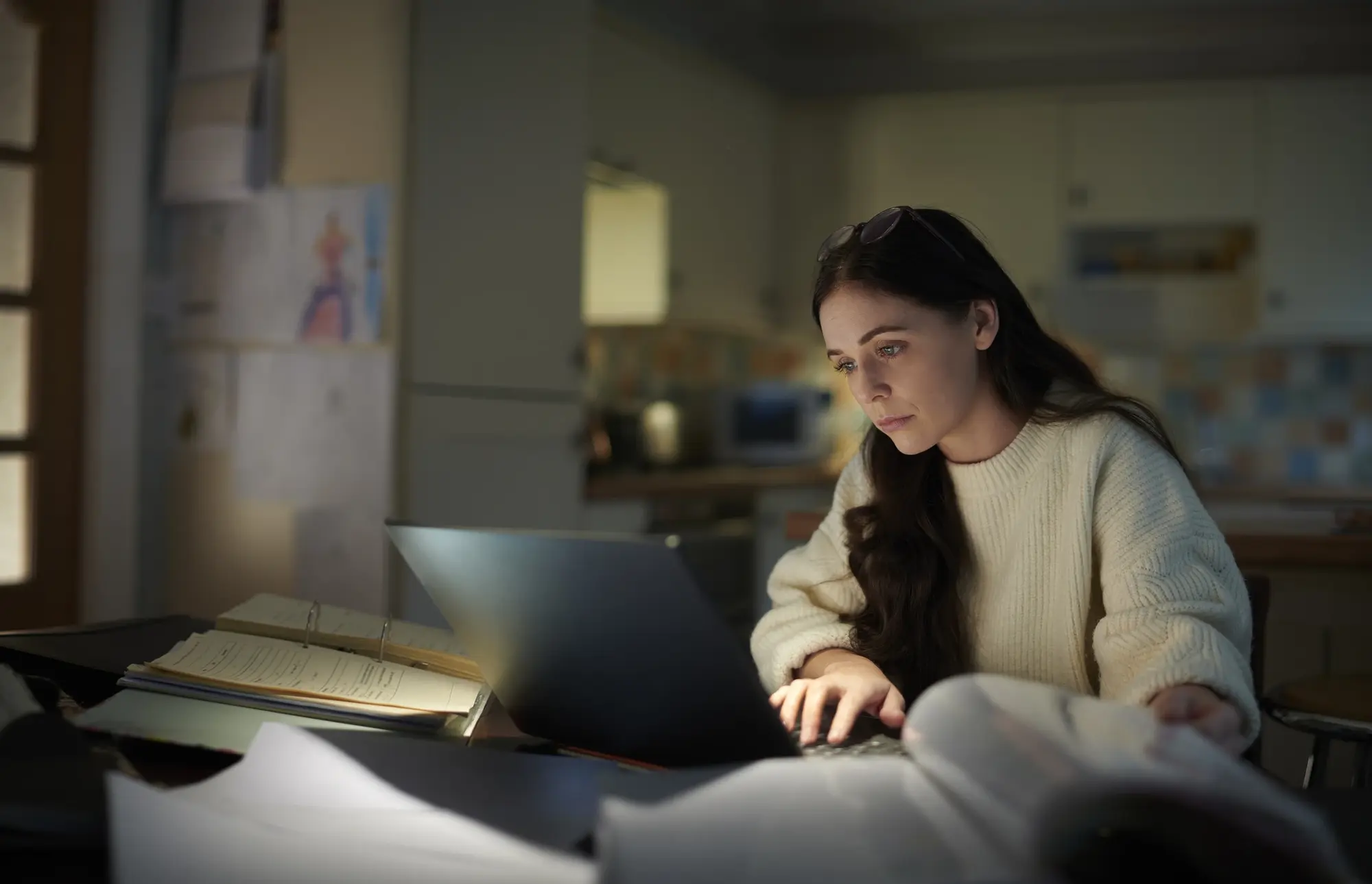 a woman working on a laptop