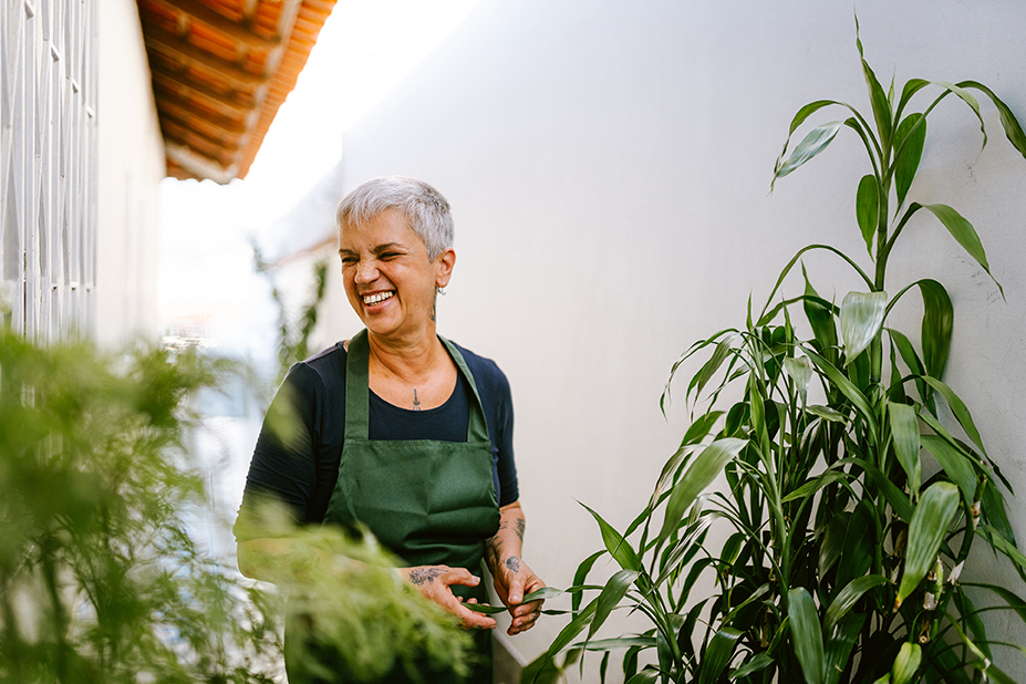smiling woman gardening