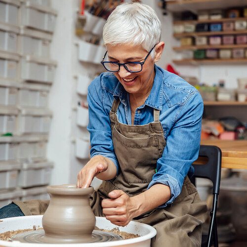 woman with pottery wheel