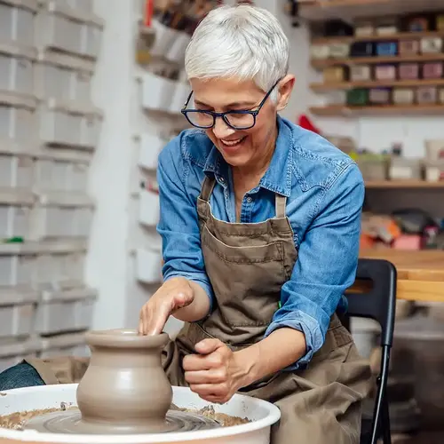 woman with pottery wheel