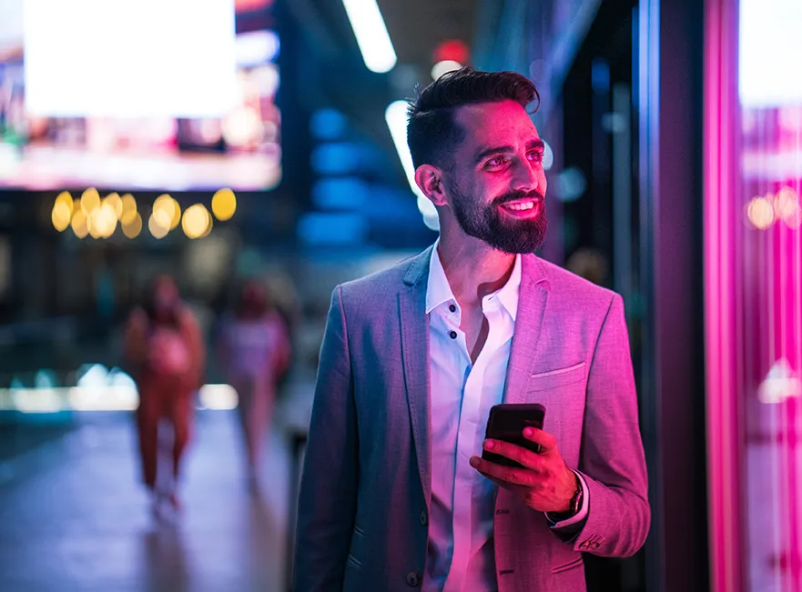 a man in a suit holding a phone