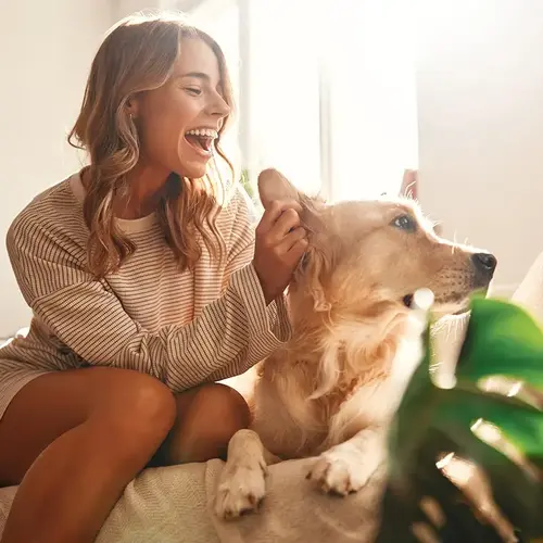 Happy woman with dog