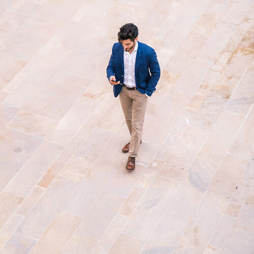 Man walking with cell phone