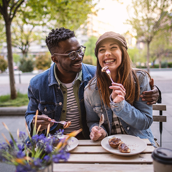 a man and woman eating food