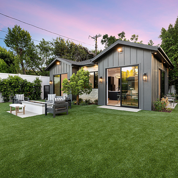 a house with a lawn and a patio