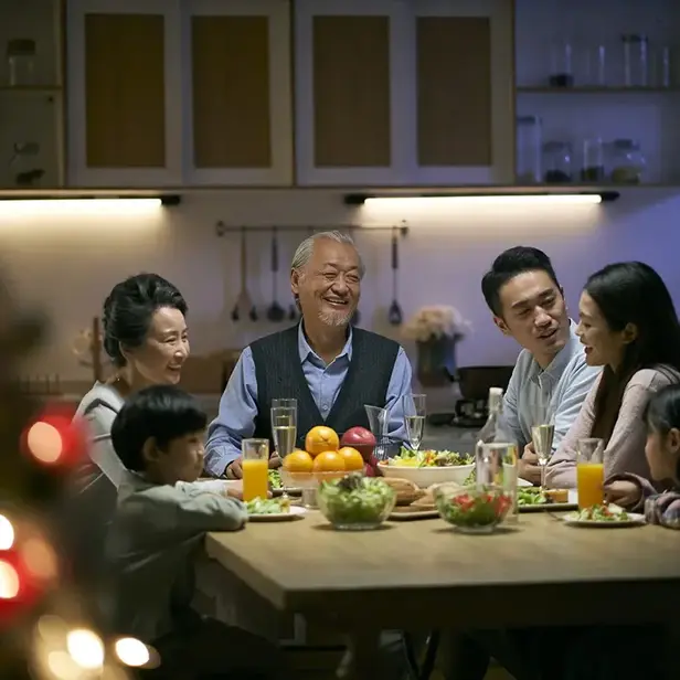 Family at dinner table, Asian